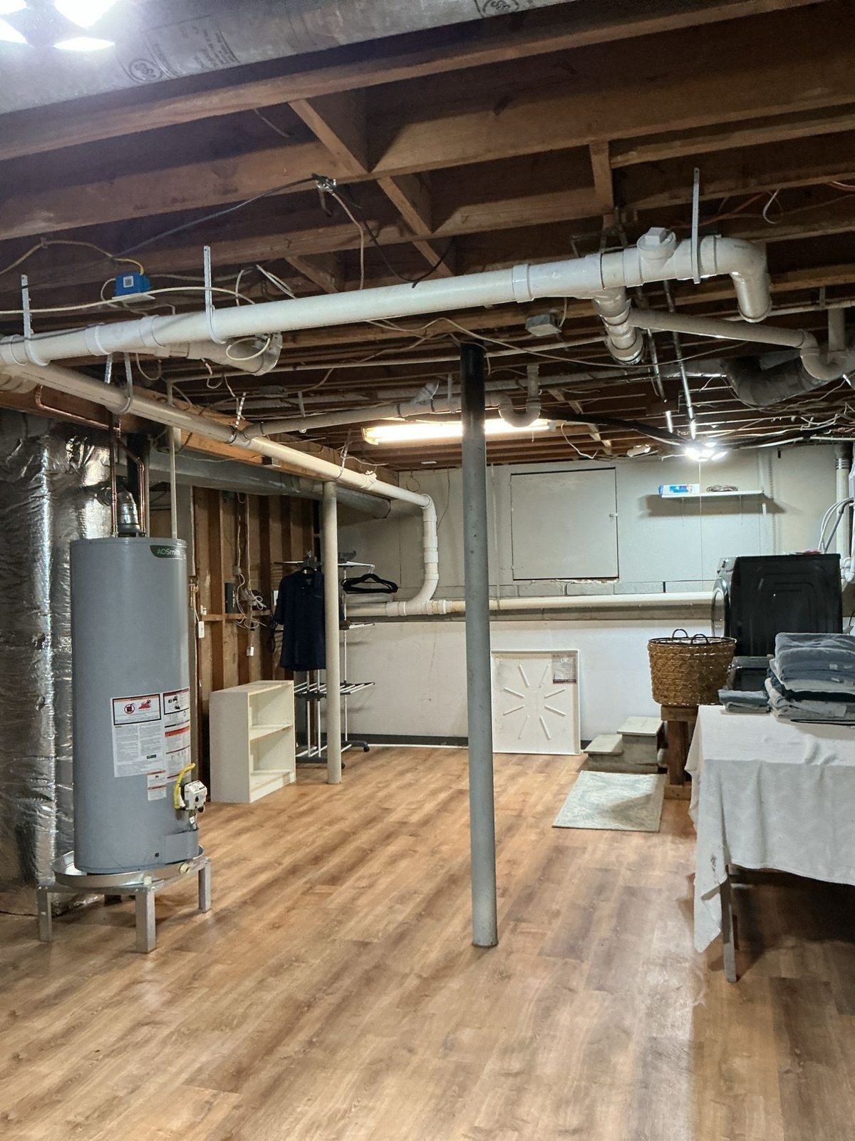 After: the same basement drains re-piped in PVC